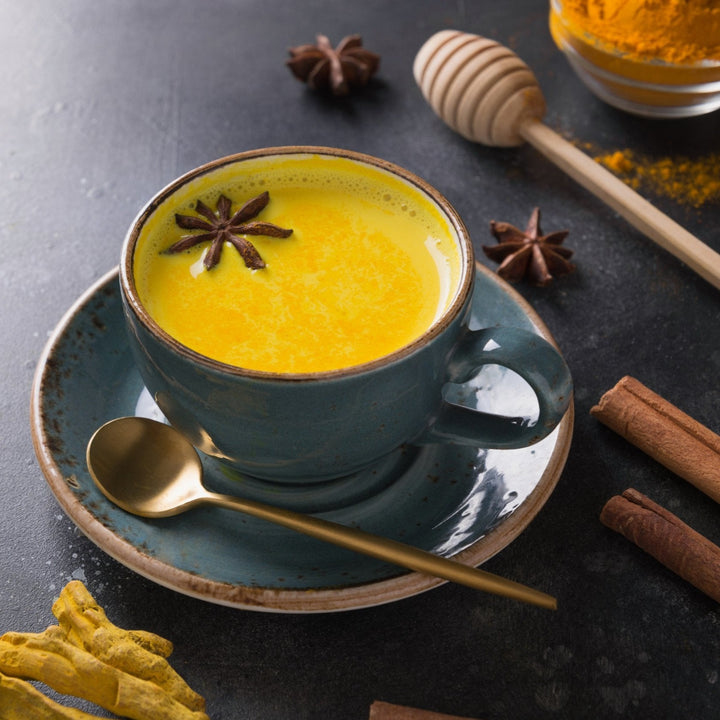 Golden Turmeric Milk Tea (Turmeric, Ginger, Cinnamon, Cardamom, Clove, Honey, Pepper, Anise, Vanilla, Whole Milk, Brown Sugar)